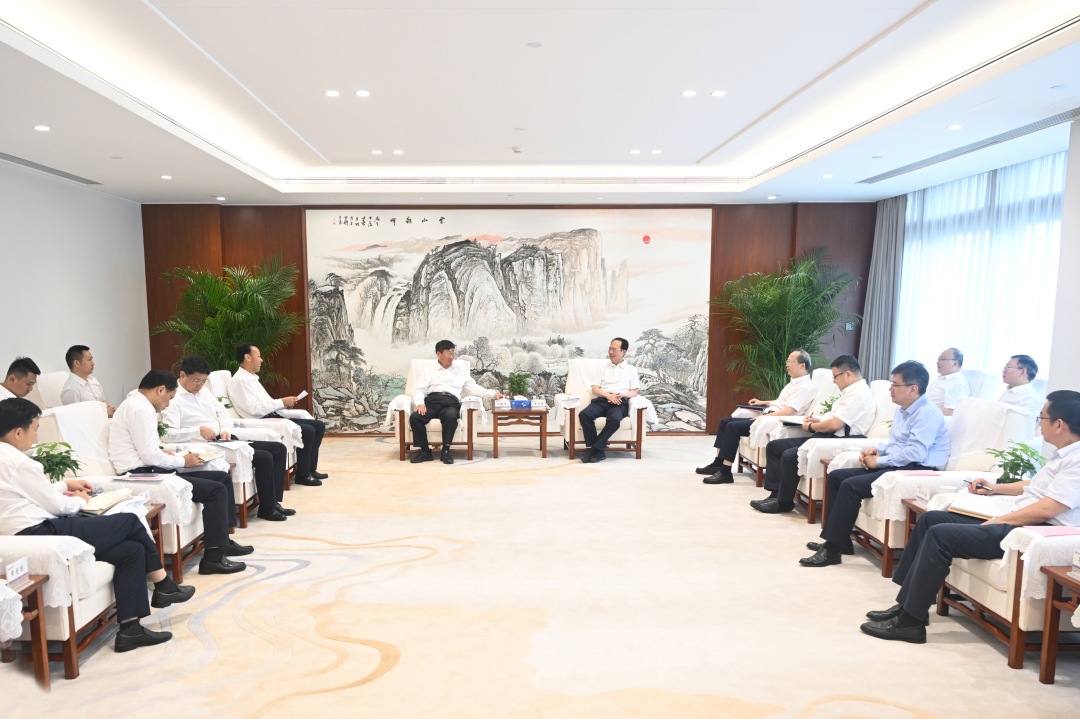 中國電建黨委書記、董事長丁焰章與中國三峽集團董事長、黨組書記劉偉平會談
